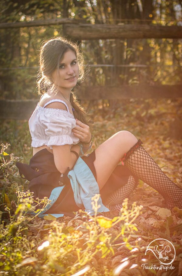 Young girl in Dirndl Dress and stockings