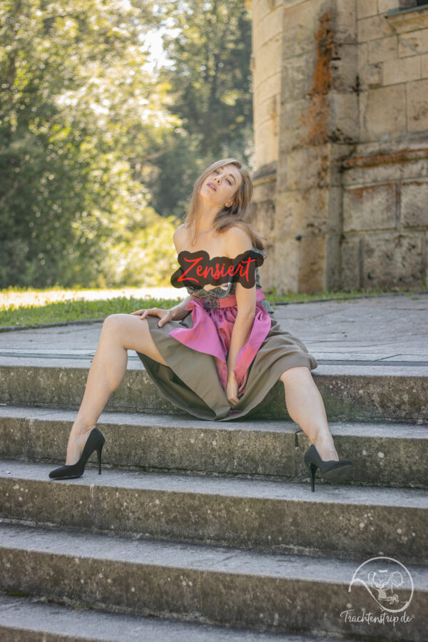 Bavarian beauty topless in a dirndl
